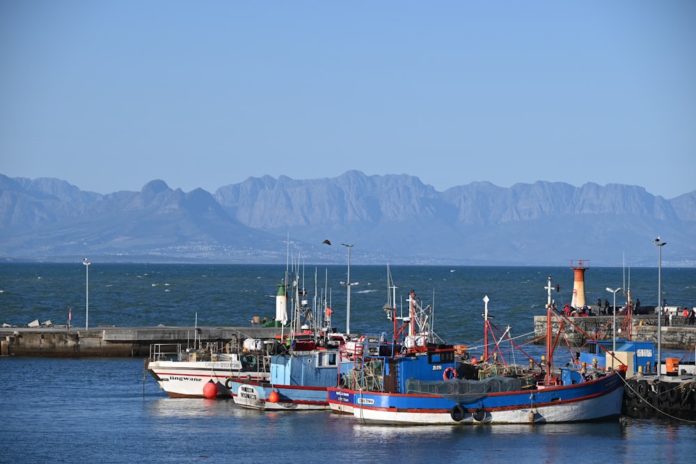 a couple of boats that are sitting in the water