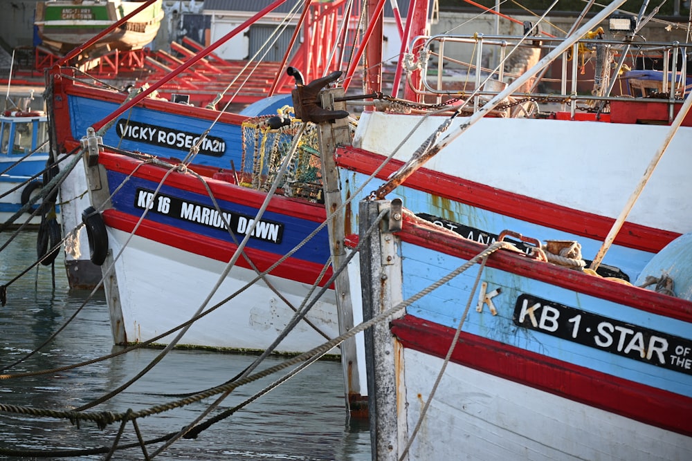 a group of boats that are sitting in the water