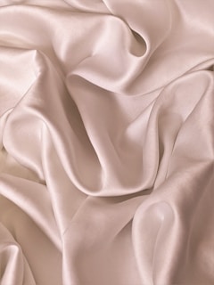 a close up view of a white fabric