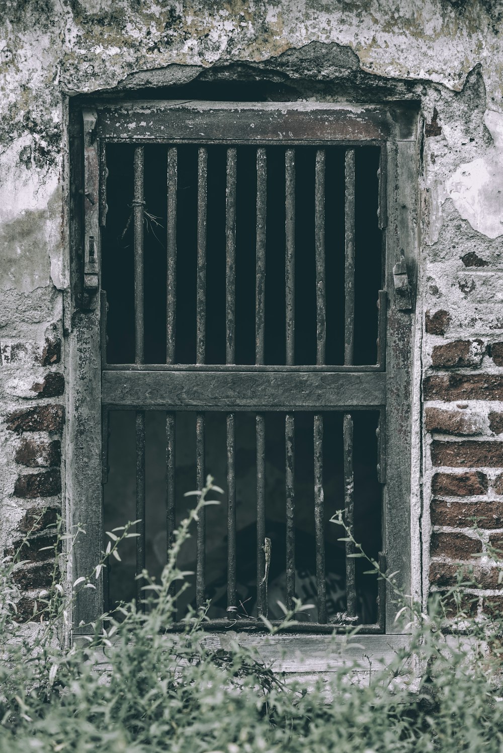 an old jail cell with bars on it