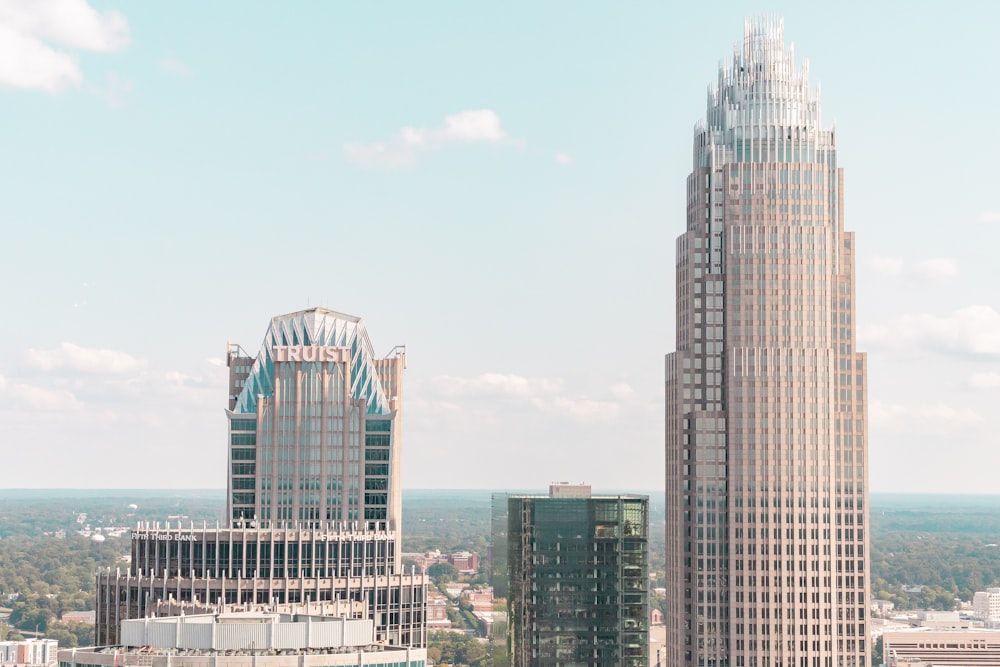 a view of two tall buildings in a city