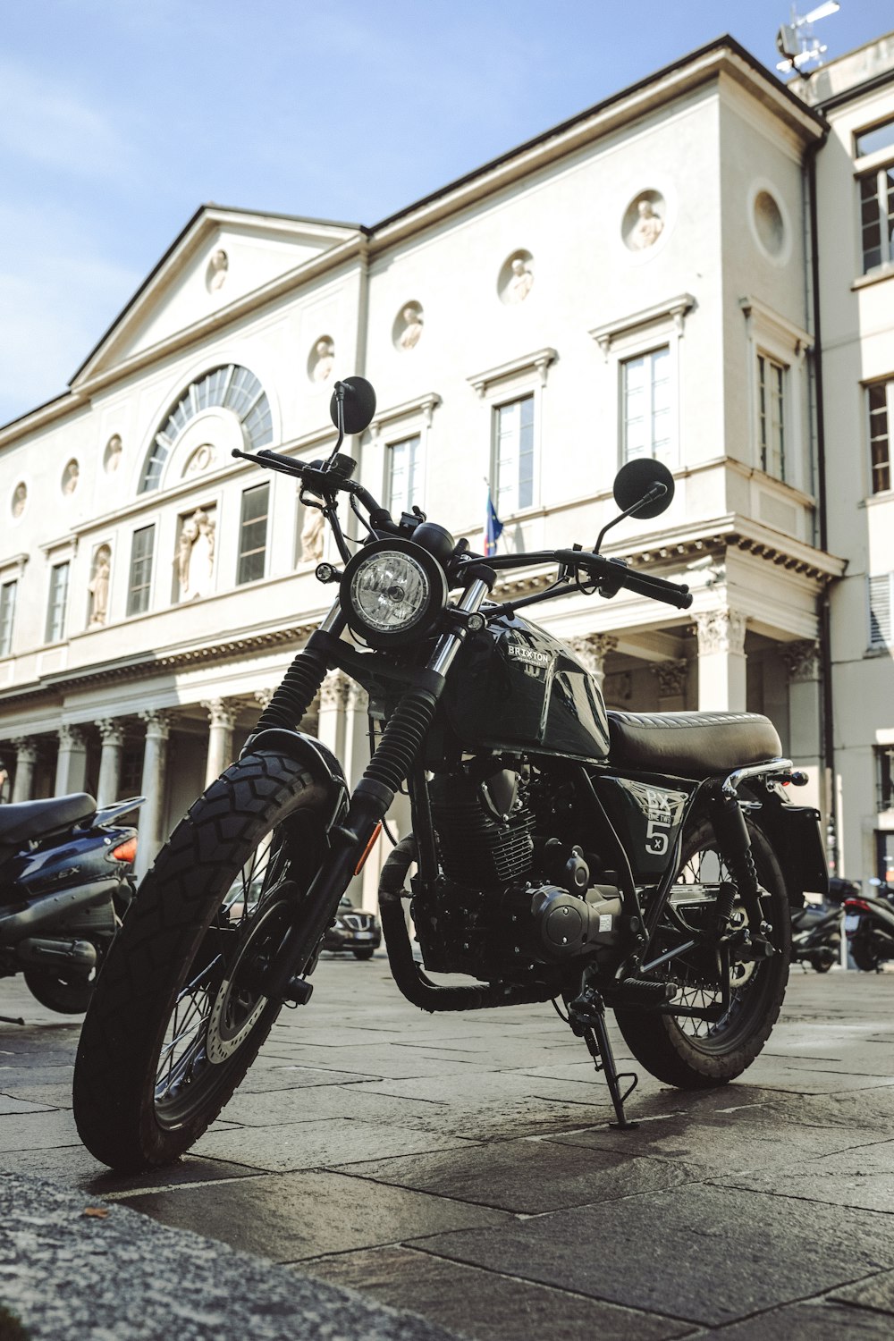 a motorcycle parked on the side of the road