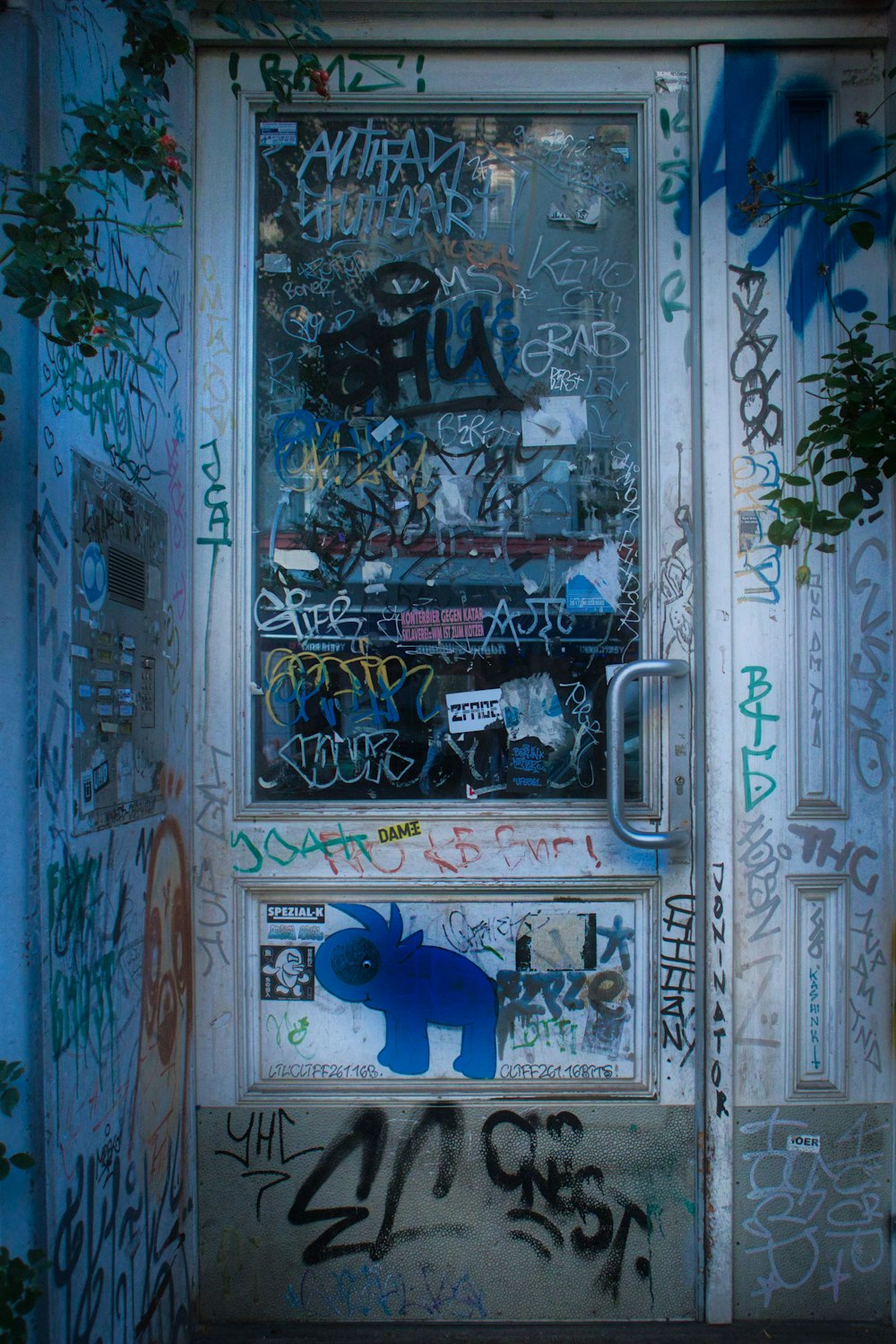 a door with graffiti all over it
