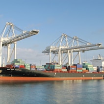 a large cargo ship in a large body of water