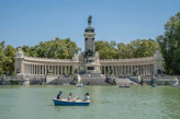 a couple of people in a small boat in the water