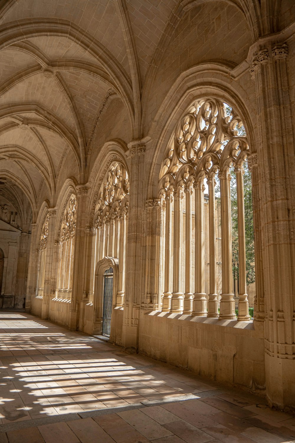 a large building with many windows and arches