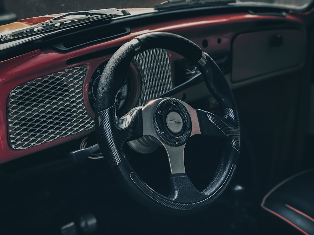 a steering wheel and dashboard of a car