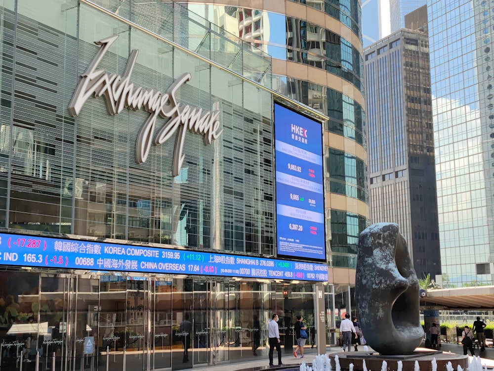 a statue of a bear in front of a building