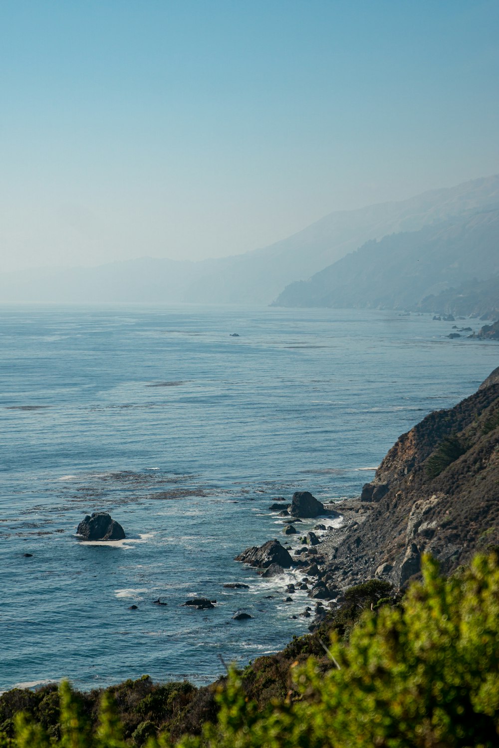 a view of the ocean from a cliff