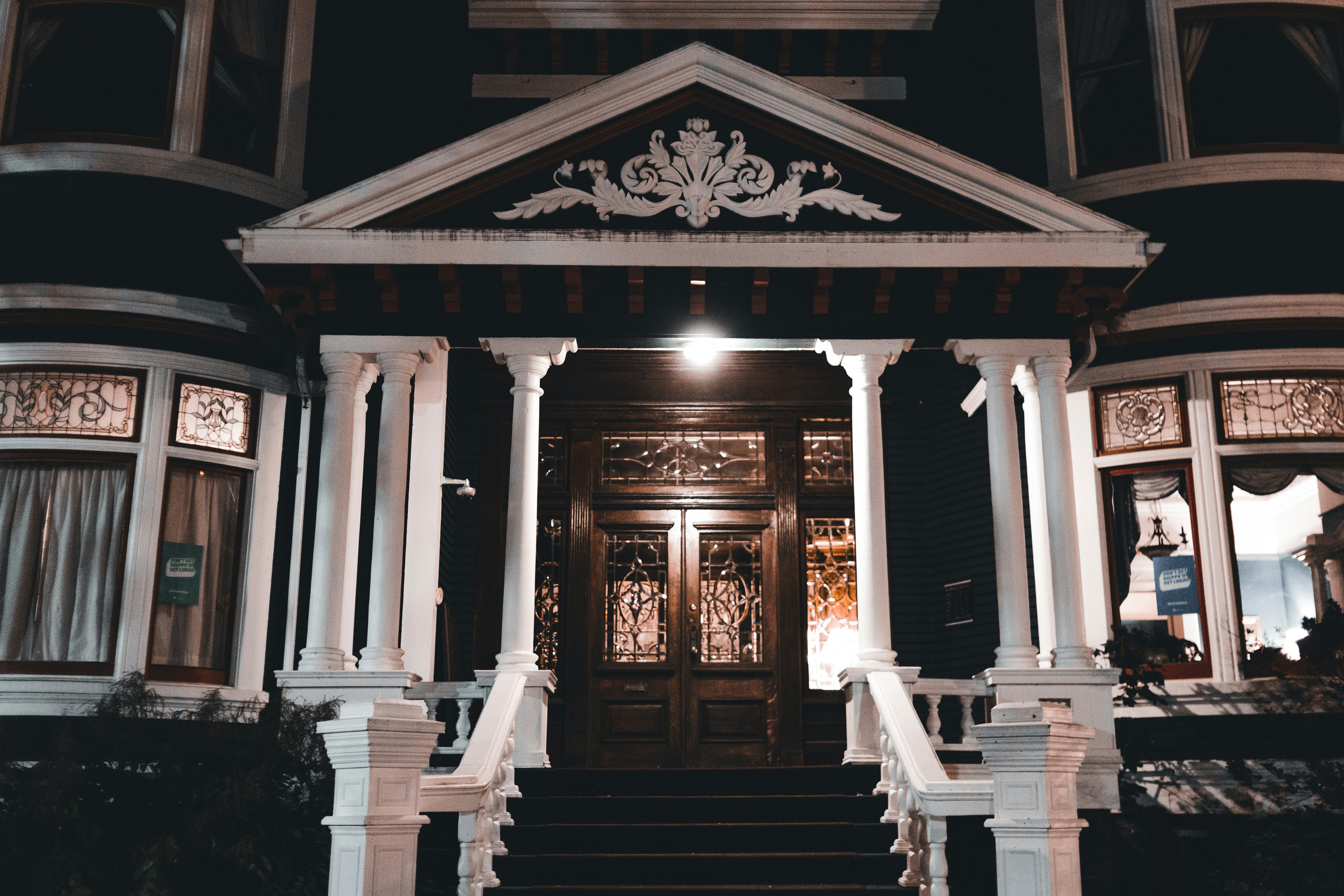 a house with a large front door at night