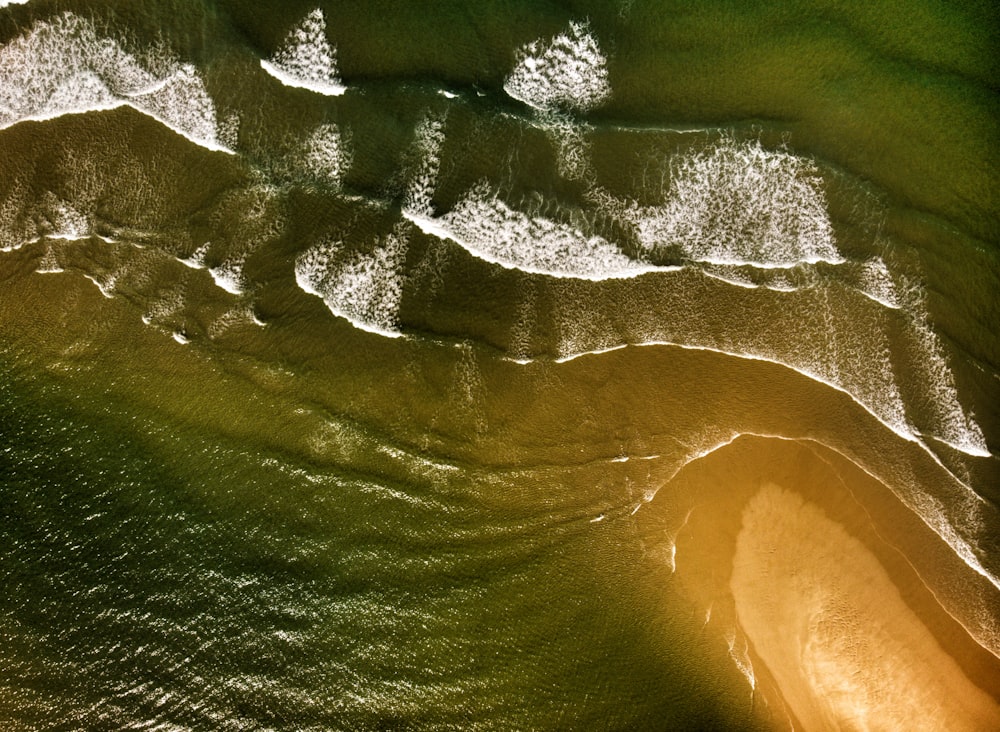 a bird's eye view of the ocean waves