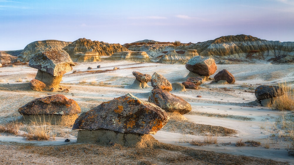 a group of large rocks in a desert