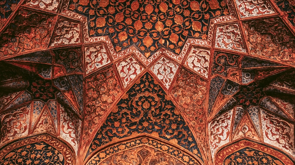 an intricately designed ceiling in a building