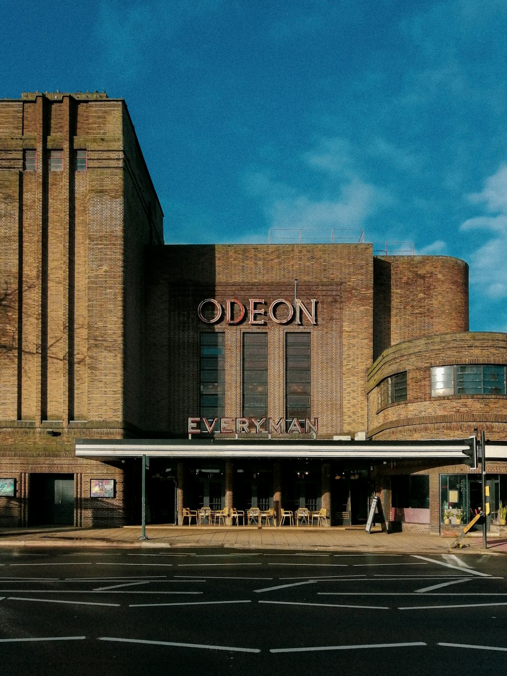 a large brick building with a sign on the front of it