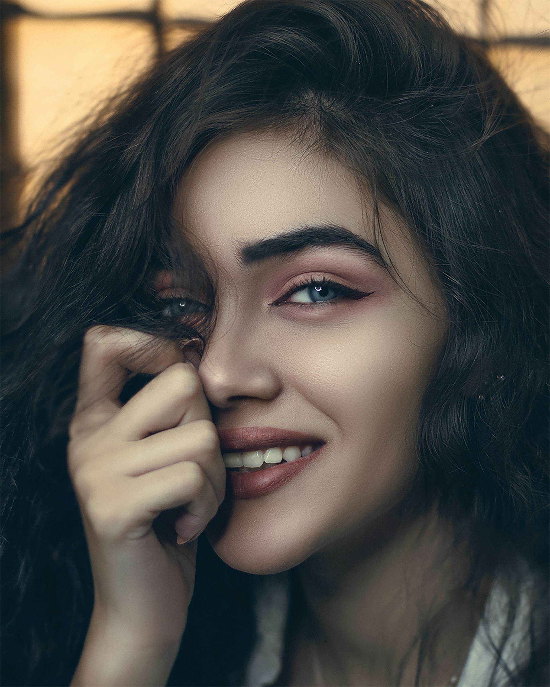 a close up of a person with long hair