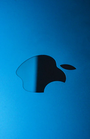 an apple logo is shown on a blue background