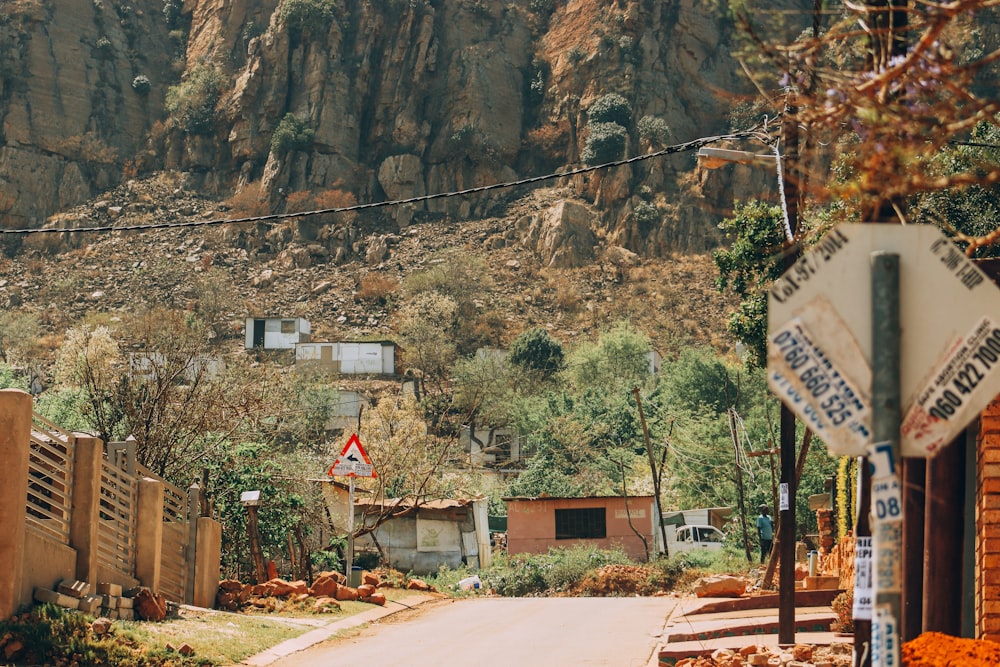 a street with a mountain in the background