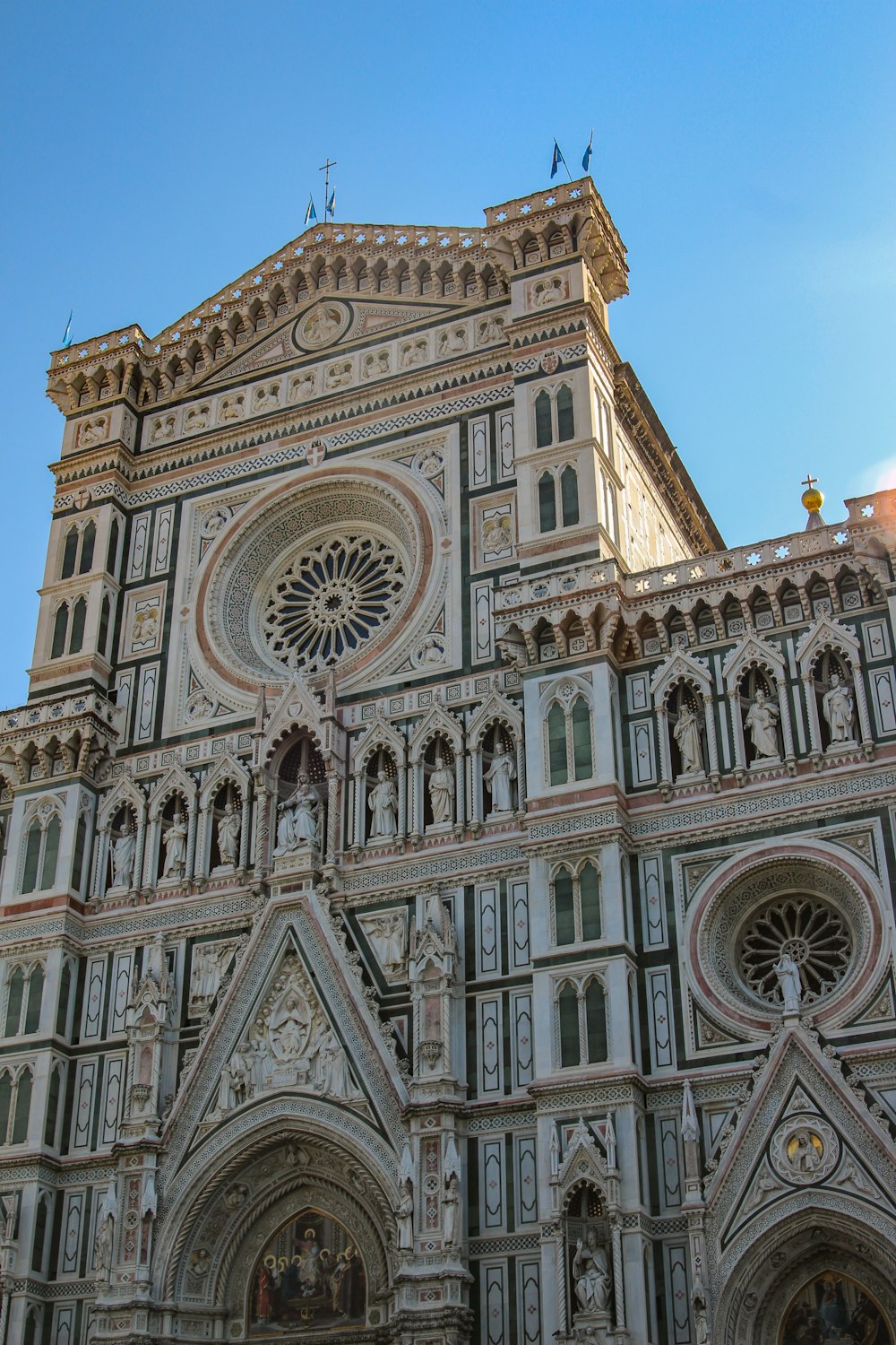 a large cathedral with a clock on the front of it