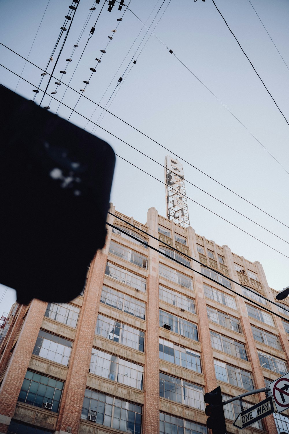 a tall building sitting next to a traffic light