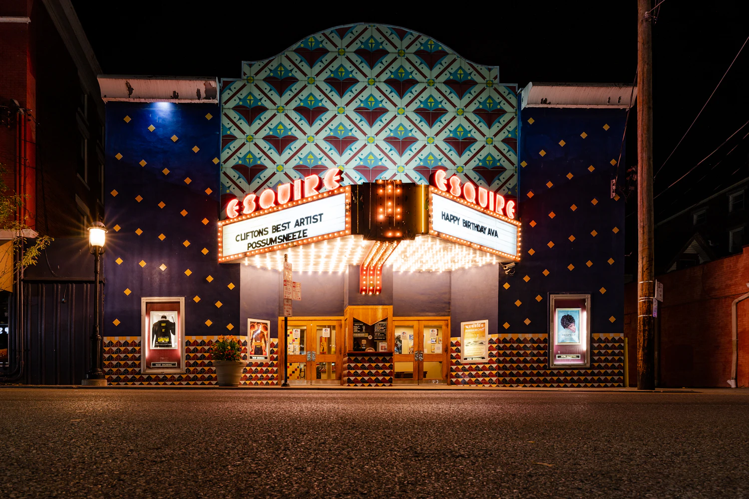 A theater marquee lit up at night