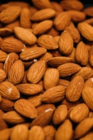a pile of almonds sitting on top of each other