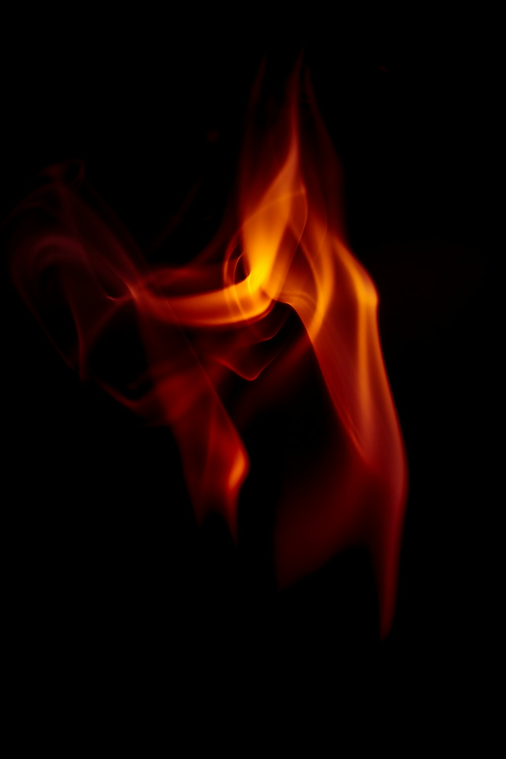 a black background with red and yellow flames