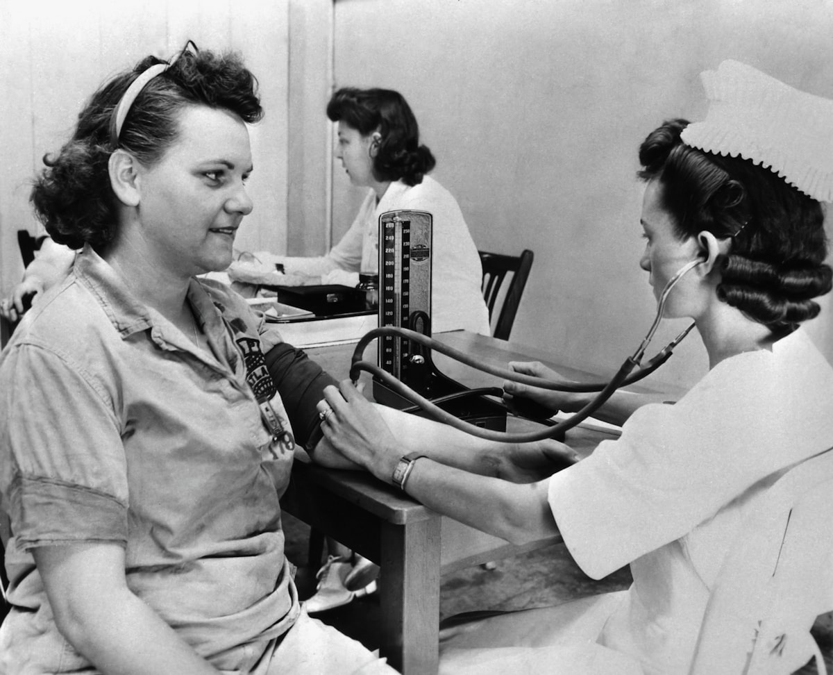 Wound care nurse using AI tools to assess and document a patient wound at the bedside in 2026