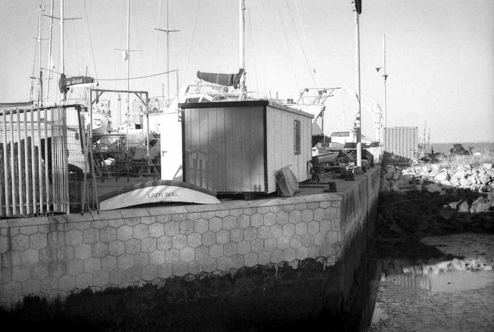 a black and white photo of a boat in the water