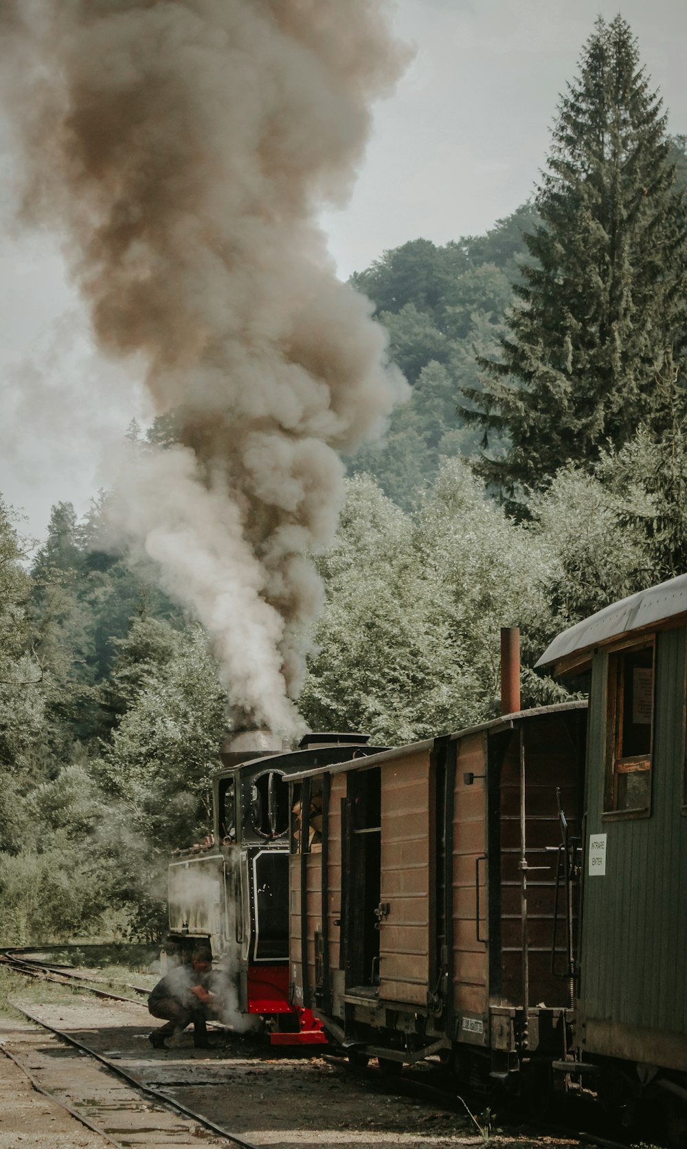 a train with smoke coming out of it