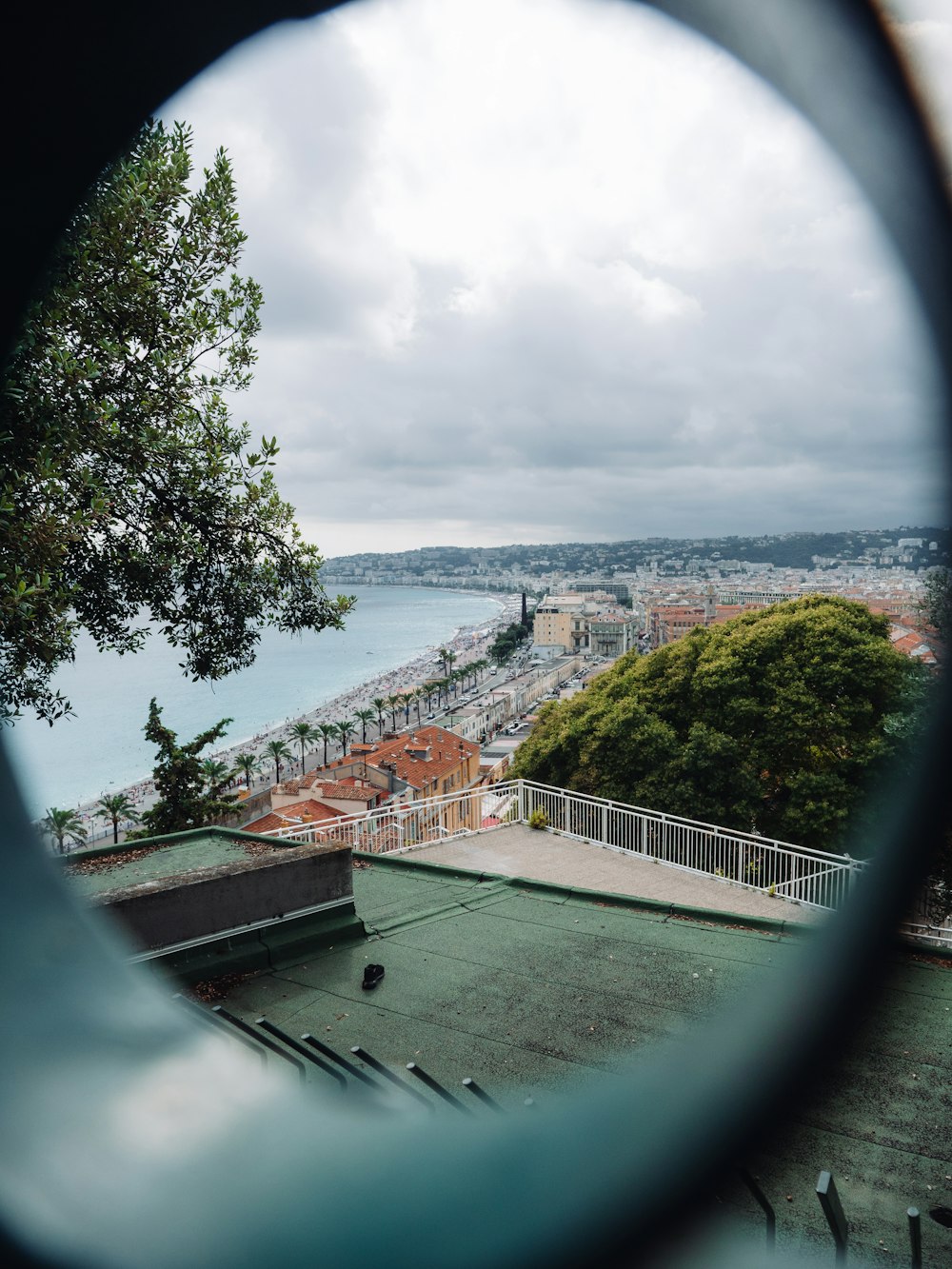 a view of a city through a magnifying glass