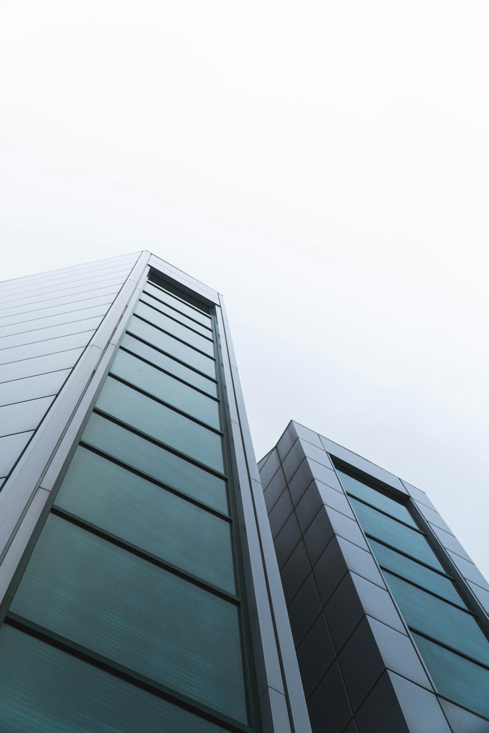 a tall building with a sky background