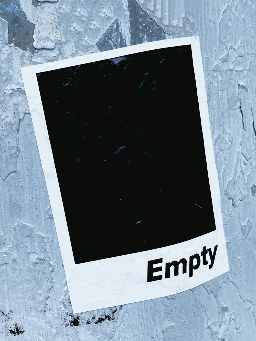 an empty polaroid with the word empty on it