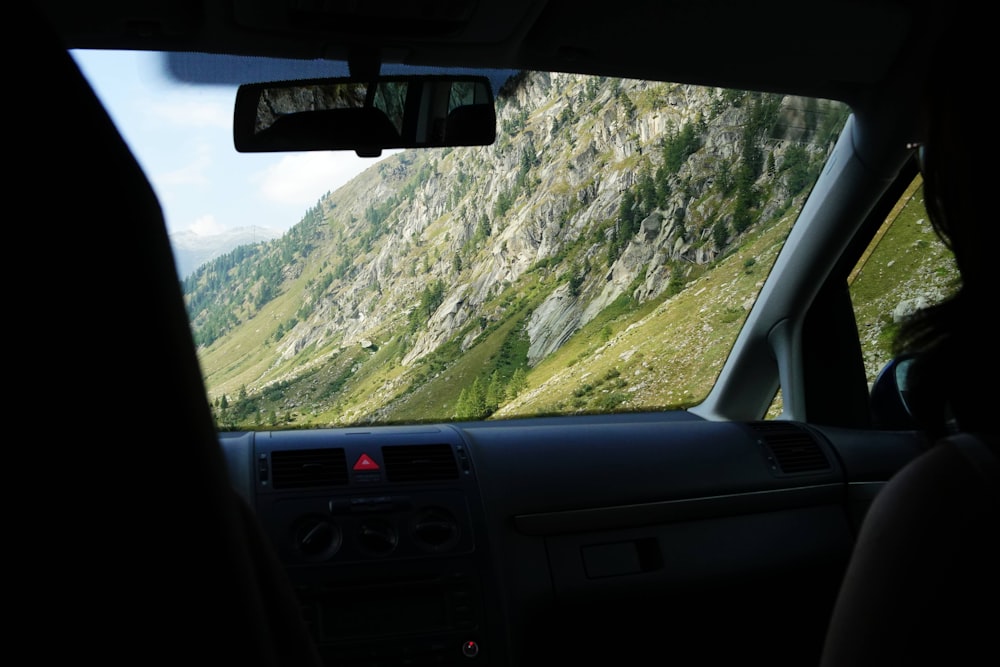 a view from inside a car of a mountain