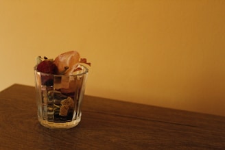 Close-up of vibrant botanical extracts in glass containers, highlighting natural ingredients.