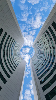 a very tall building with a sky in the background