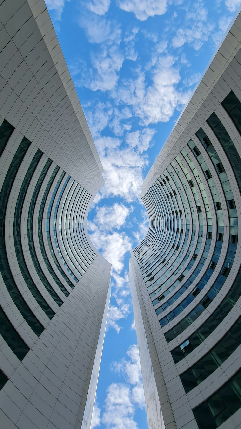 a very tall building with a sky in the background