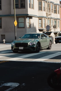 a bentley parked on the side of the road