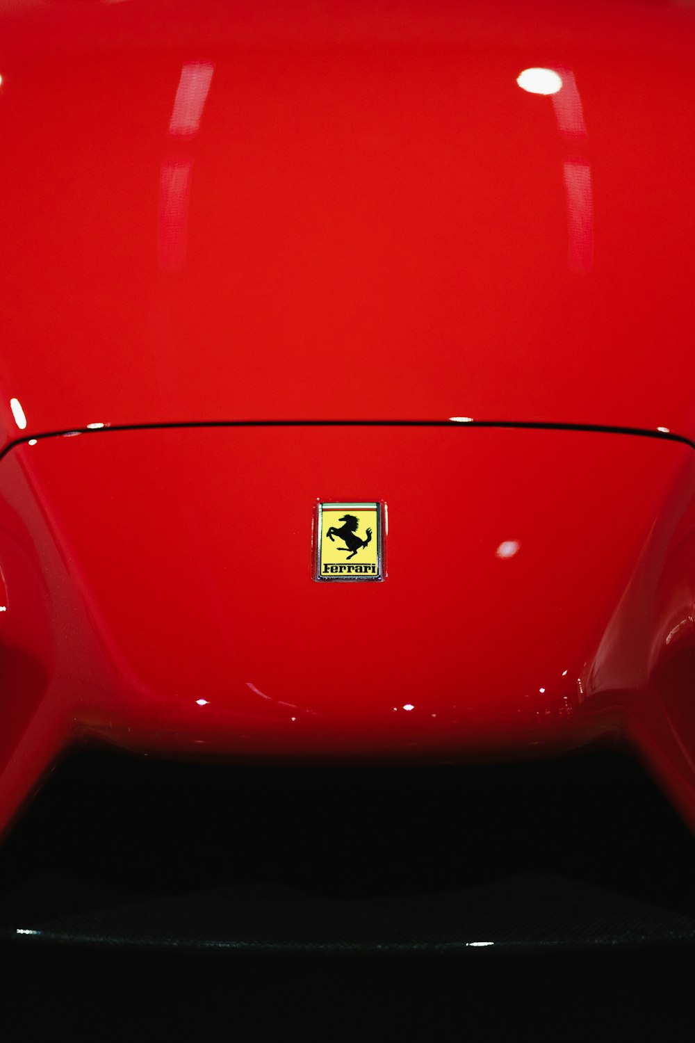 a close up of a red sports car