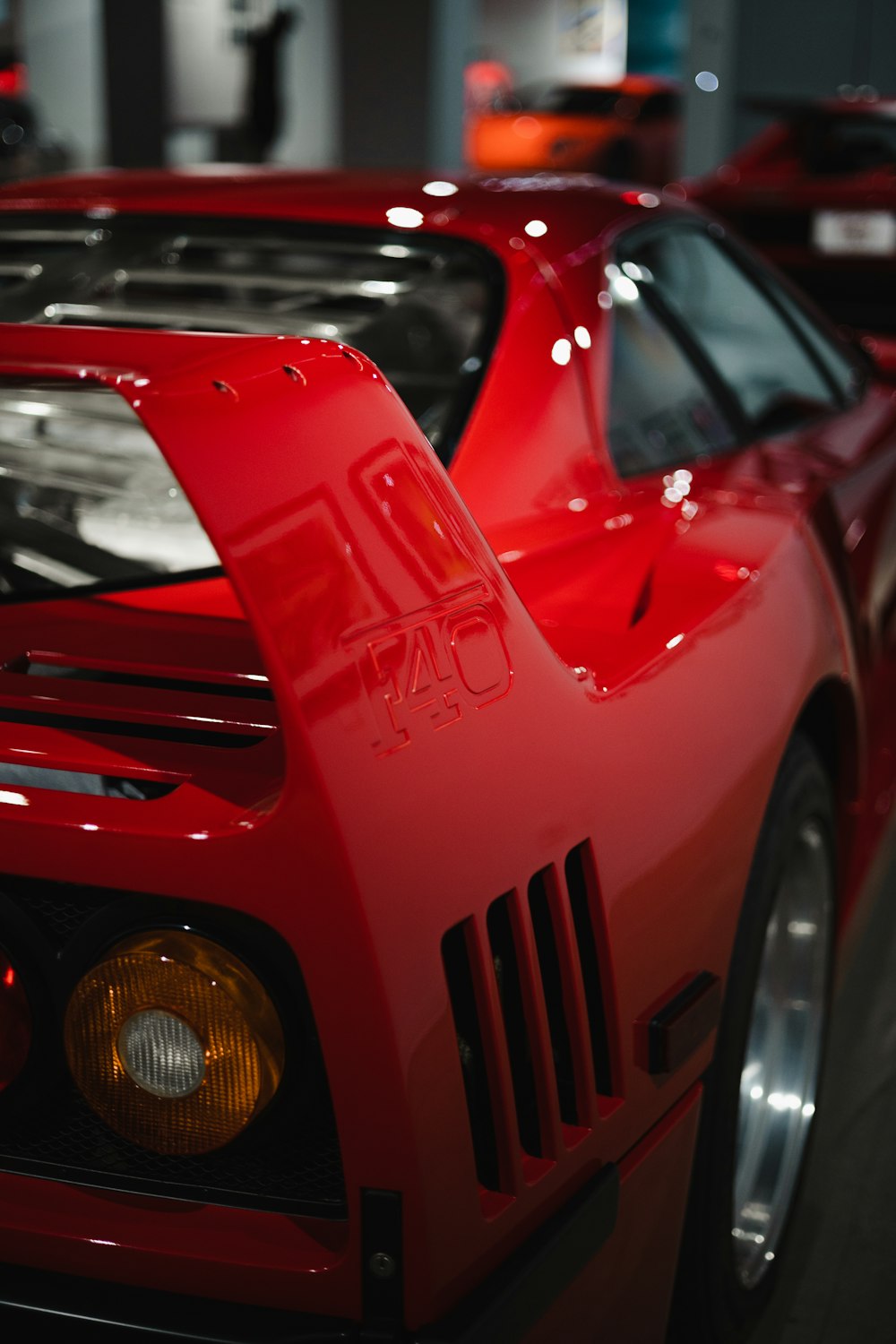 a red sports car parked in a garage