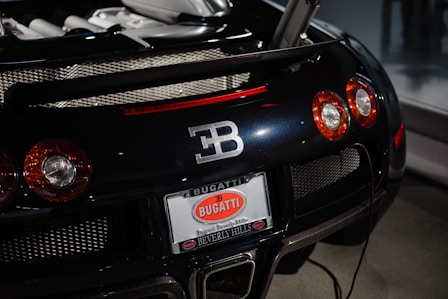 a black sports car with its hood up