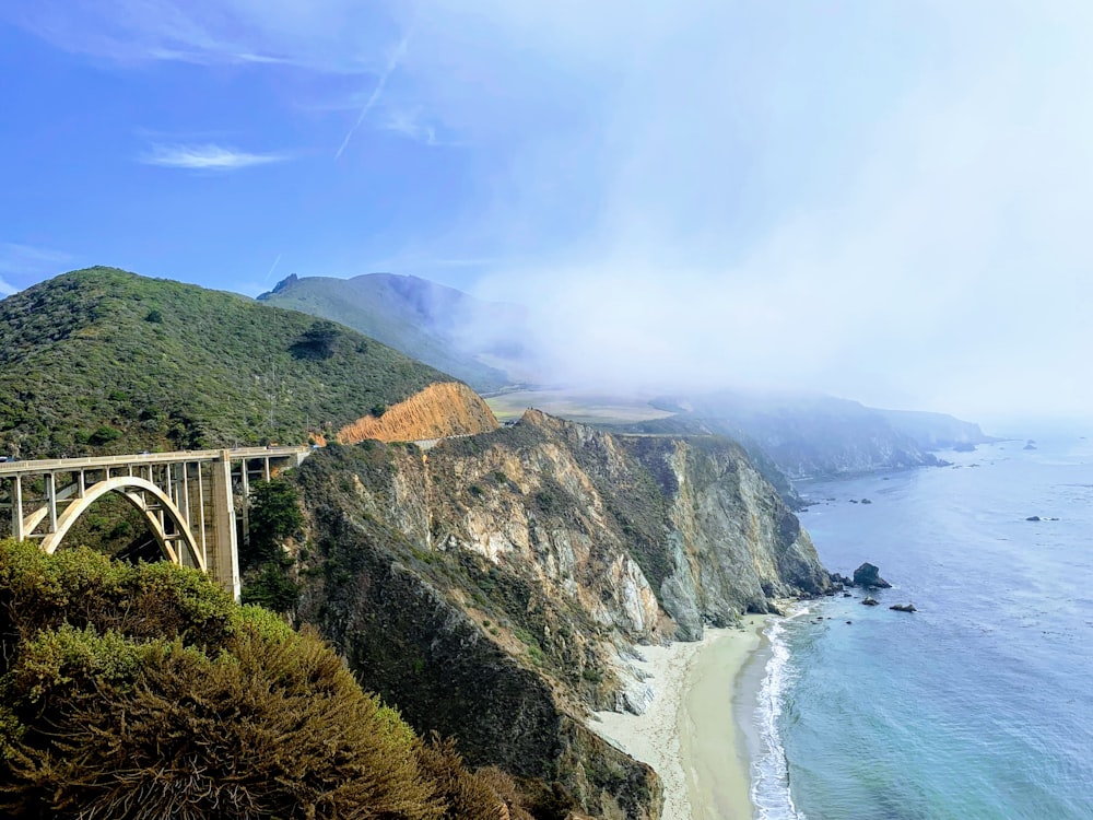 a view of a bridge over a body of water