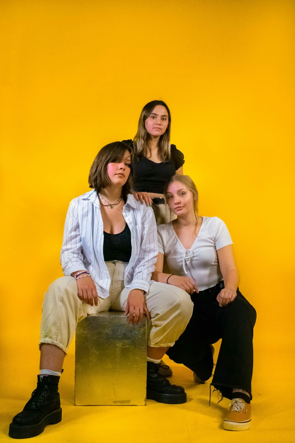 a group of women sitting next to each other