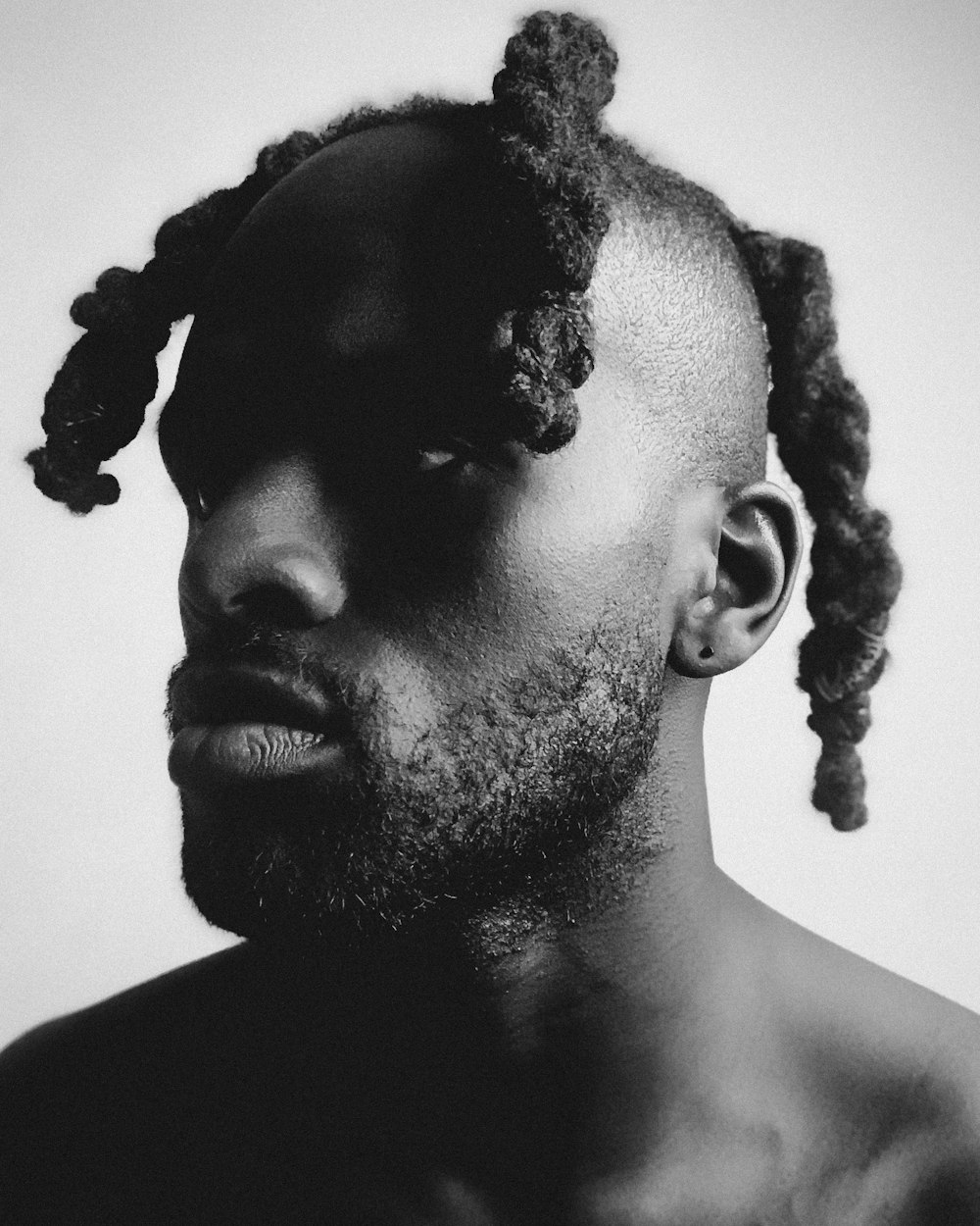 a man with dreadlocks on his head