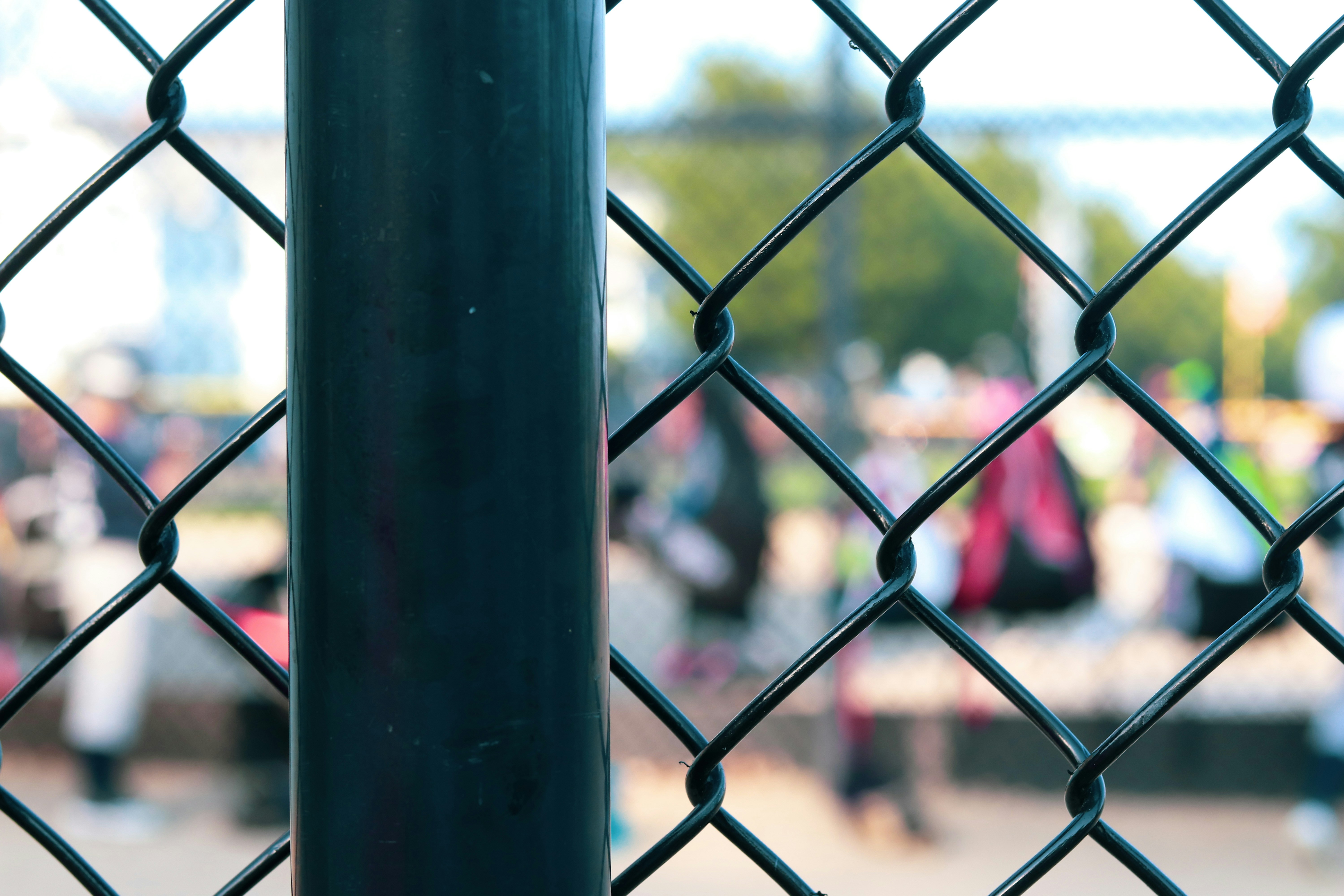a close up of a chain link fence