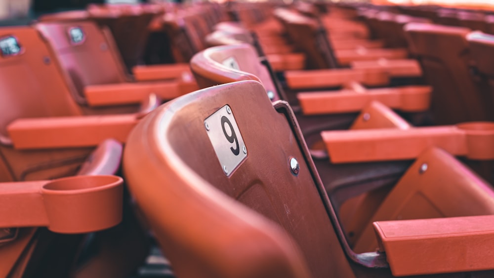 a row of seats with numbers on them