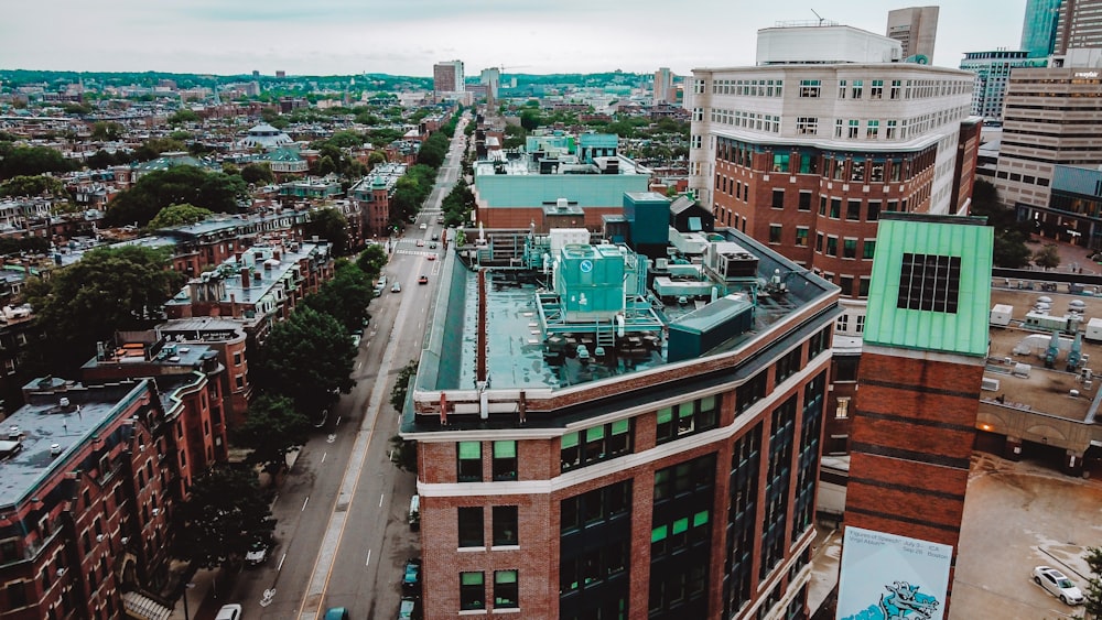 an aerial view of a city with tall buildings