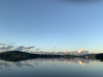 A serene data lake landscape with a clear blue sky reflecting on the water.