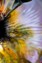 Matras flowing gently across a dark yellow backdrop, symbolizing spiritual energy and wisdom.