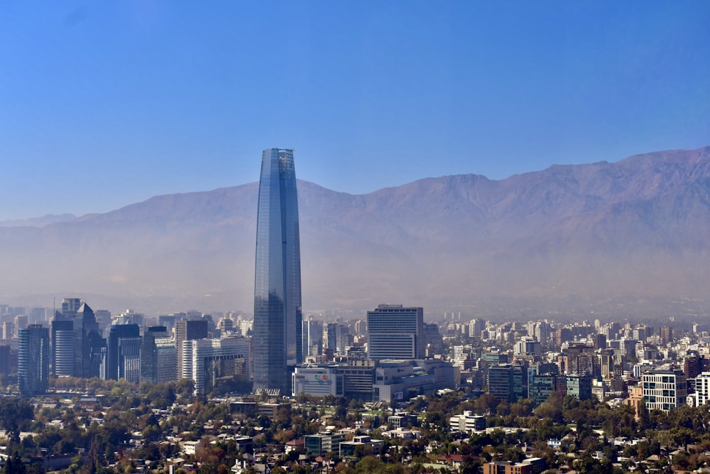 a view of a city with mountains in the background