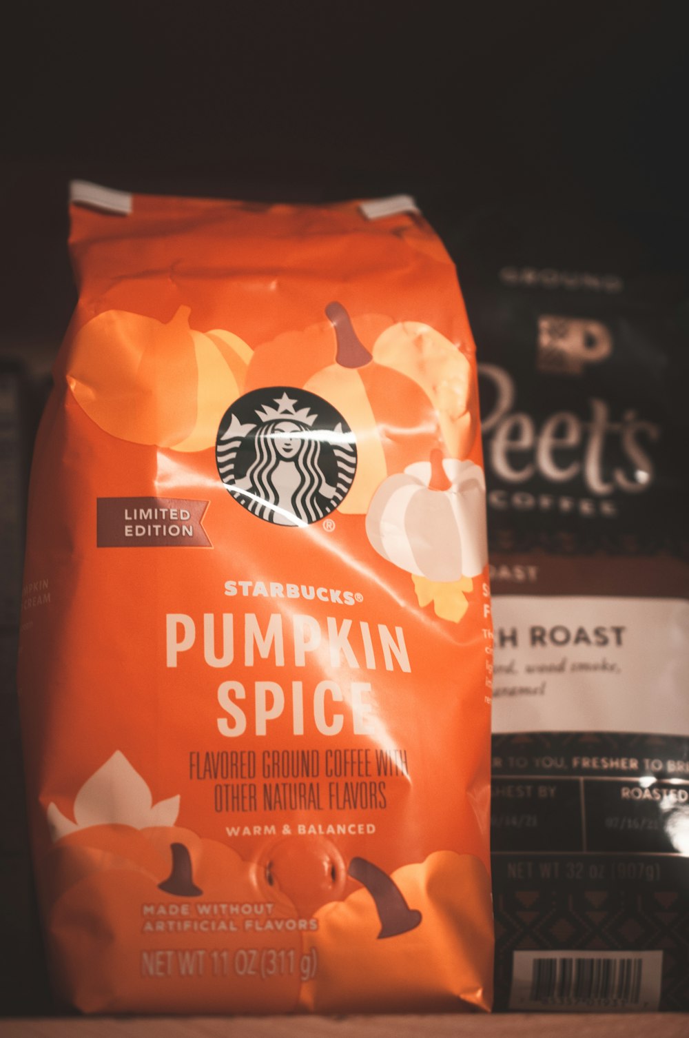 a bag of starbucks pumpkin spice sitting on top of a counter